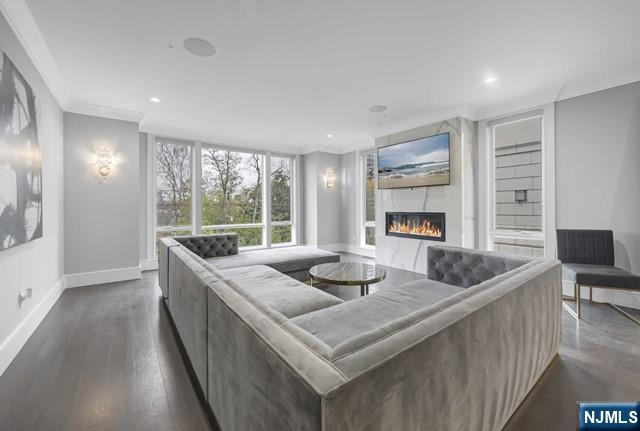 1234 River Road Edgewater, NJ 07020 - Photo 9 of 29 a living room with furniture and a large window