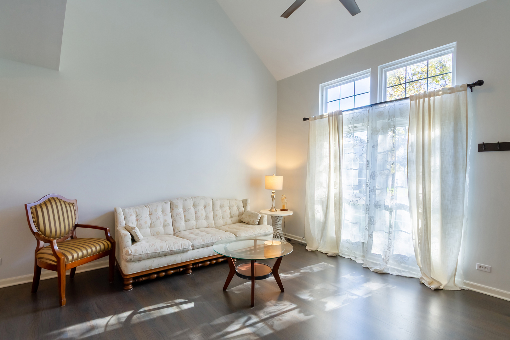 1734 Somerfield Lane Crystal Lake, IL 60014 - Photo 4 of 25 a living room with furniture and a window