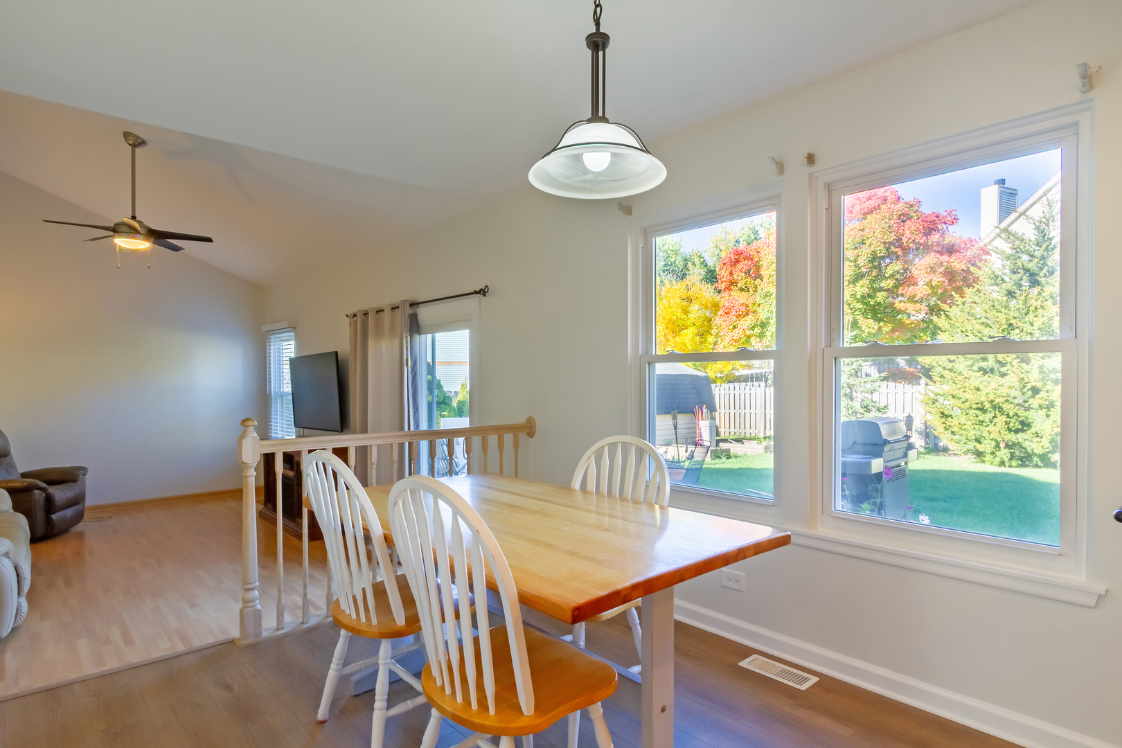 1734 Somerfield Lane Crystal Lake, IL 60014 - Photo 10 of 25 a view of a dining room with furniture window and outside view