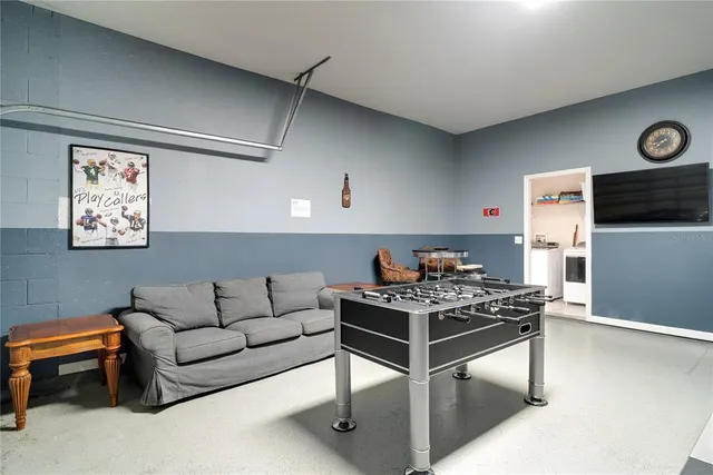 a kitchen with stainless steel appliances a sink a stove and a refrigerator