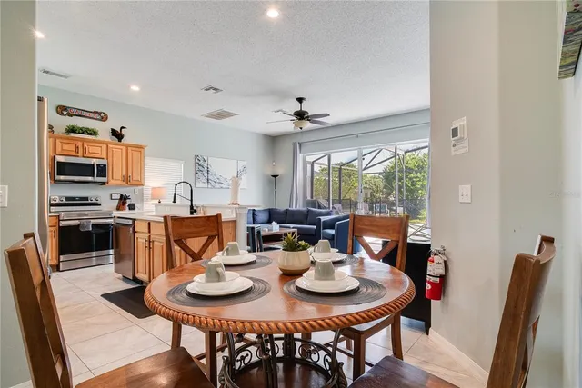 a view of a dining room with furniture window and outside view