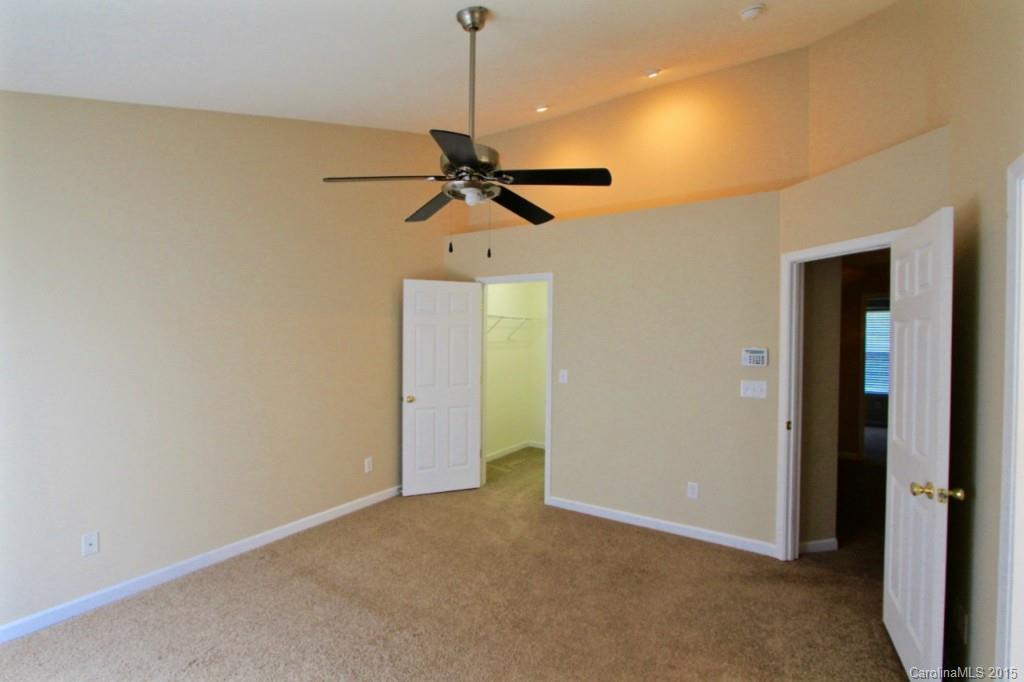 9738 Bailey Road, Unit 170 Cornelius, NC 28031 - Photo 8 of 10 a view of a room with a ceiling fan