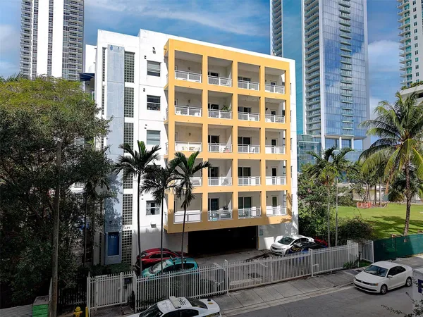 a front view of a building with street view
