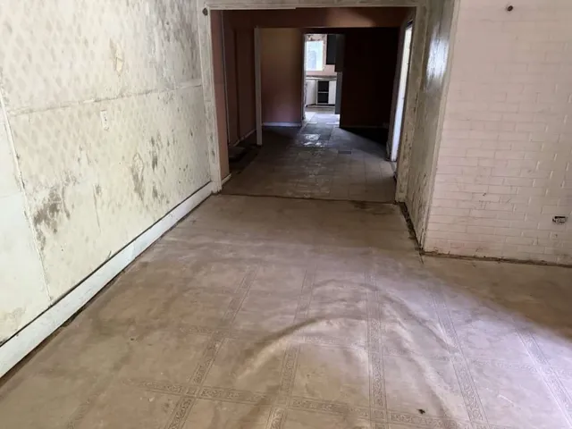 an empty room with windows