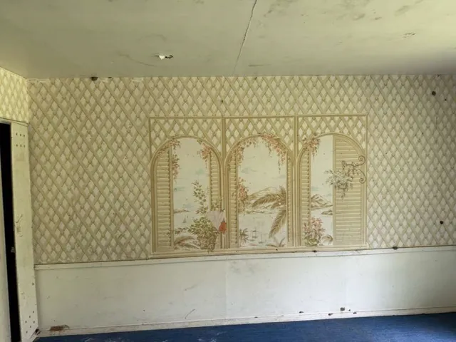 an empty room with windows