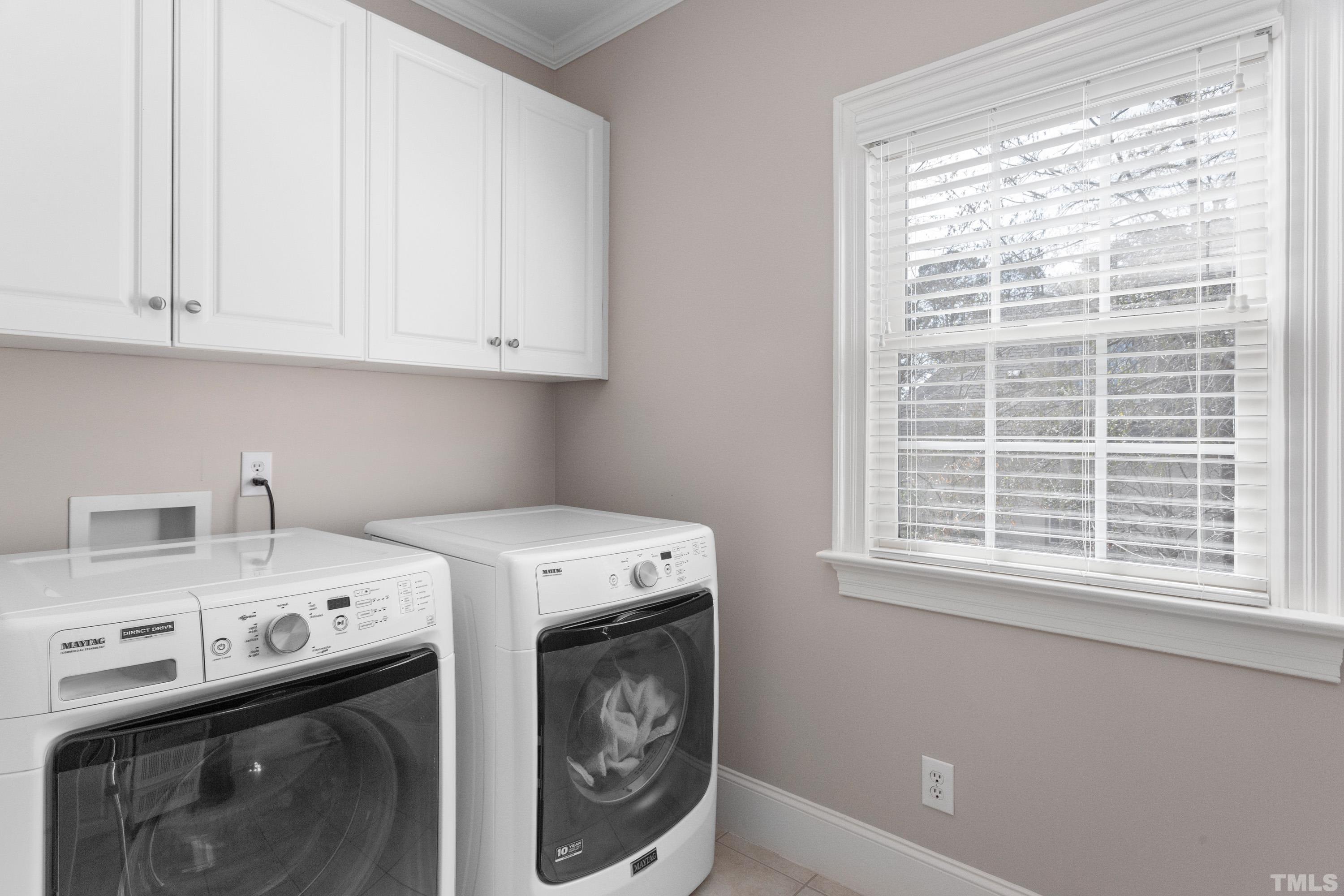 4324 Summer Brook Drive Apex, NC 27539 - Photo 39 of 70 a utility room with dryer and washer