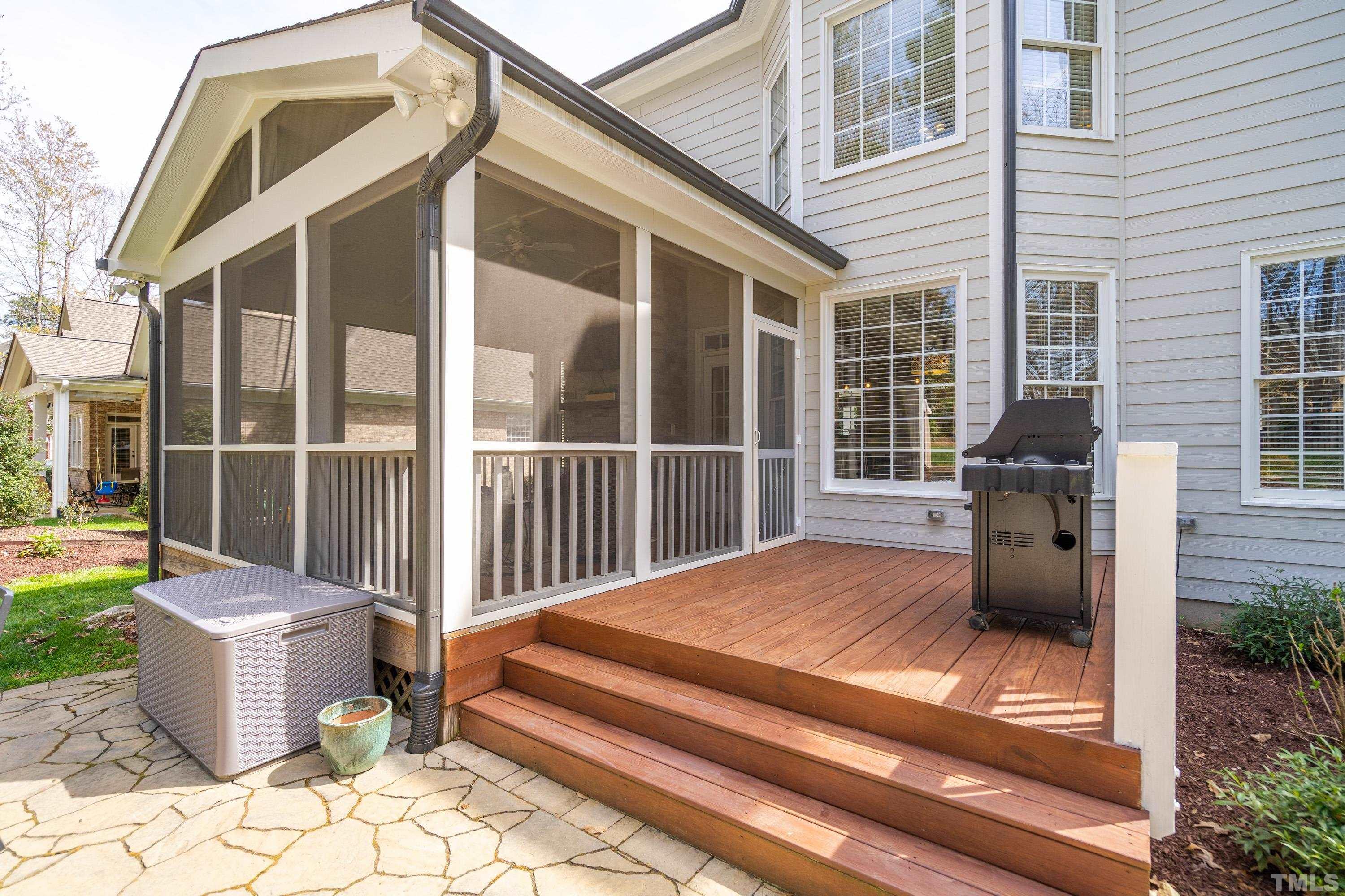 4324 Summer Brook Drive Apex, NC 27539 - Photo 43 of 70 a view of a patio with chair and tables