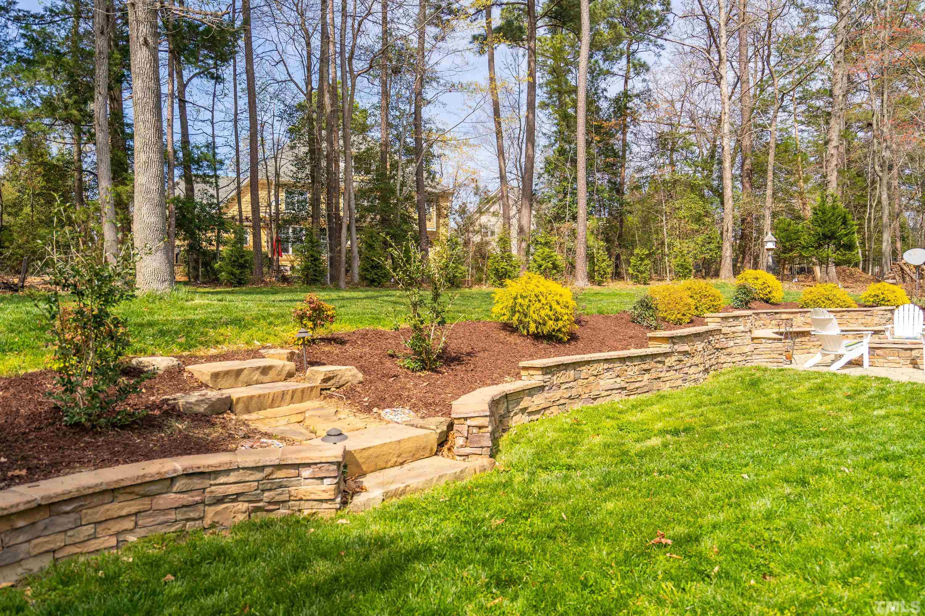 4324 Summer Brook Drive Apex, NC 27539 - Photo 48 of 70 a swimming pool with outdoor seating and yard