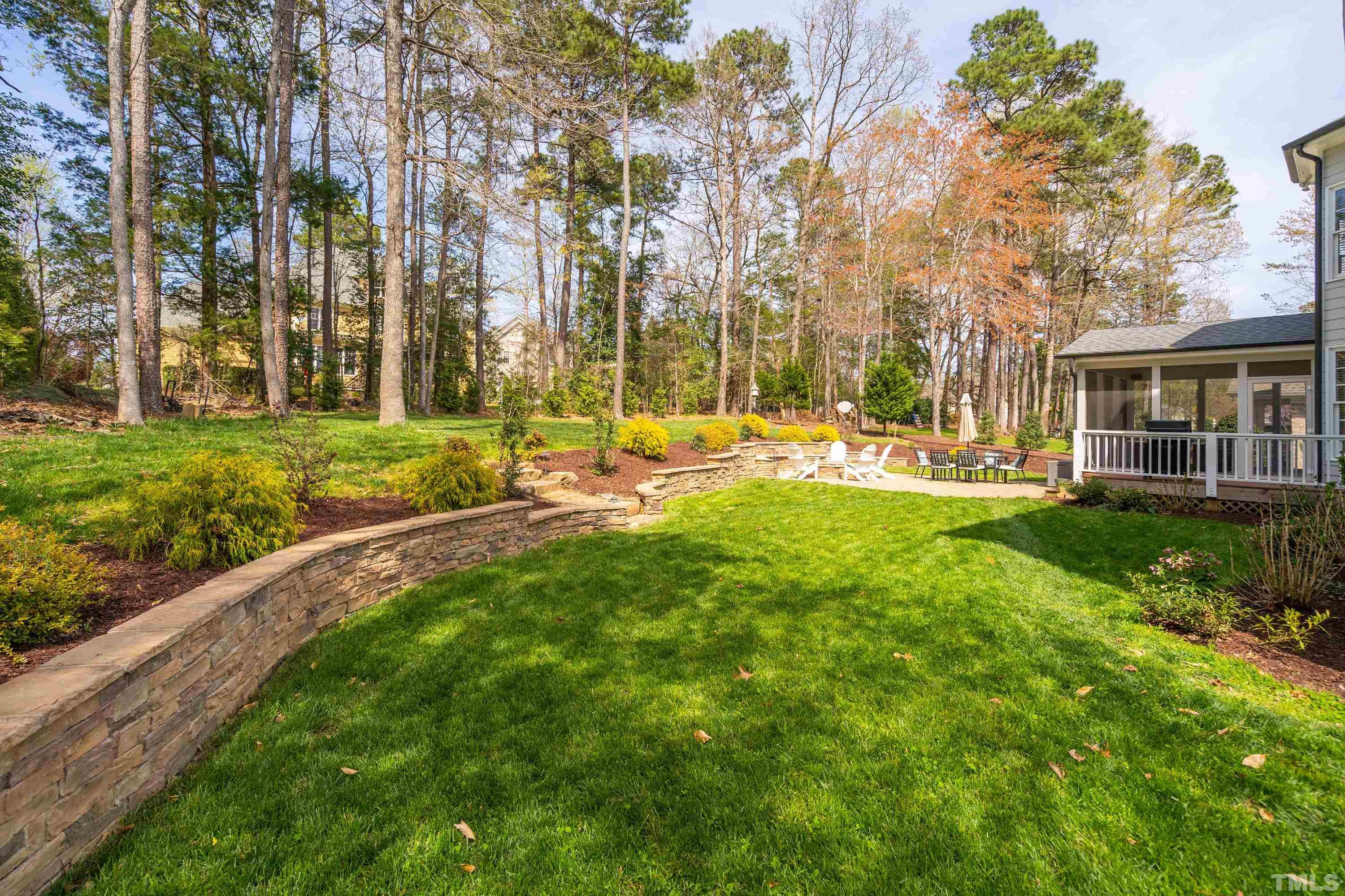 4324 Summer Brook Drive Apex, NC 27539 - Photo 49 of 70 a view of a house with a big yard and large trees