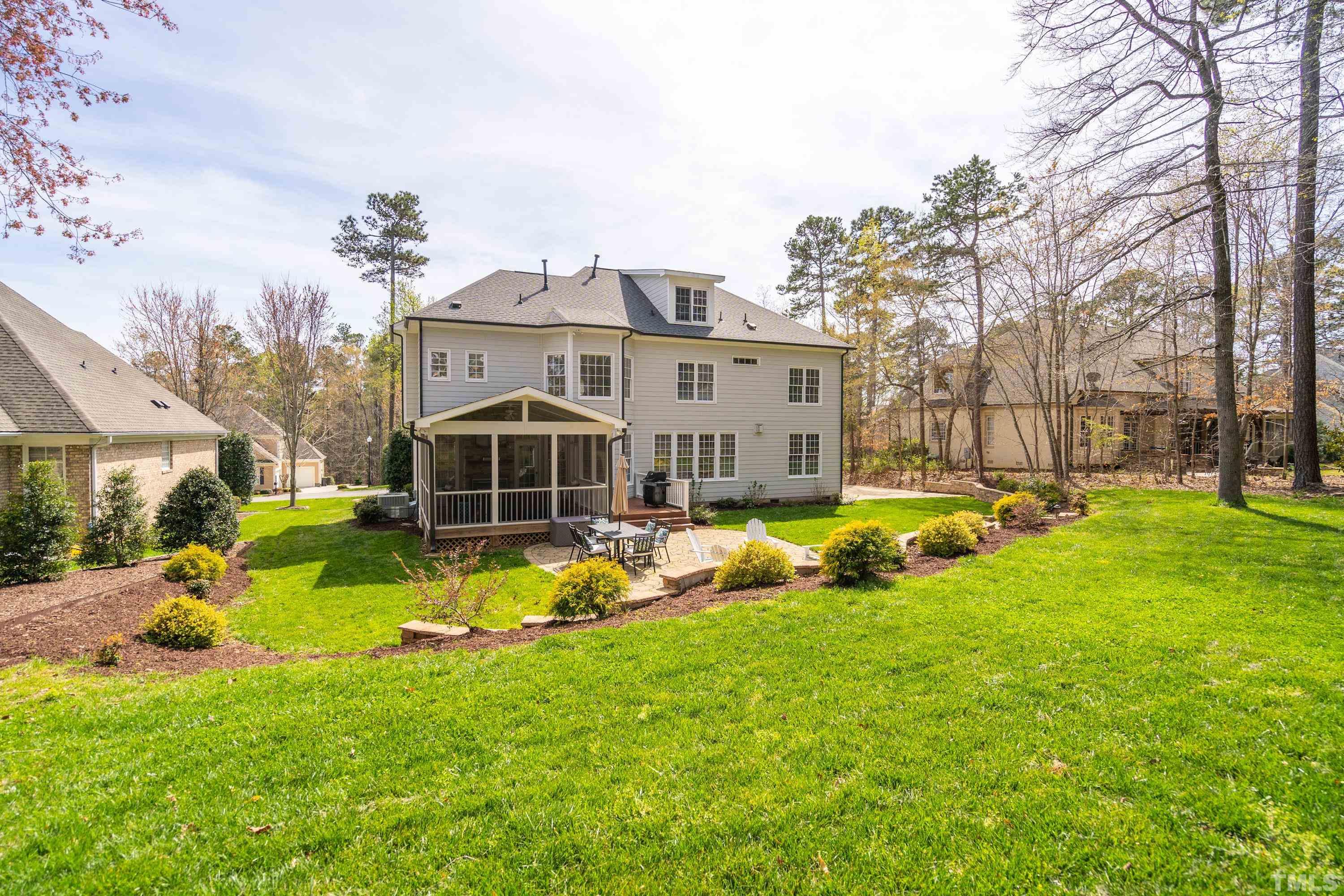 4324 Summer Brook Drive Apex, NC 27539 - Photo 53 of 70 a view of a house with a big yard and large trees
