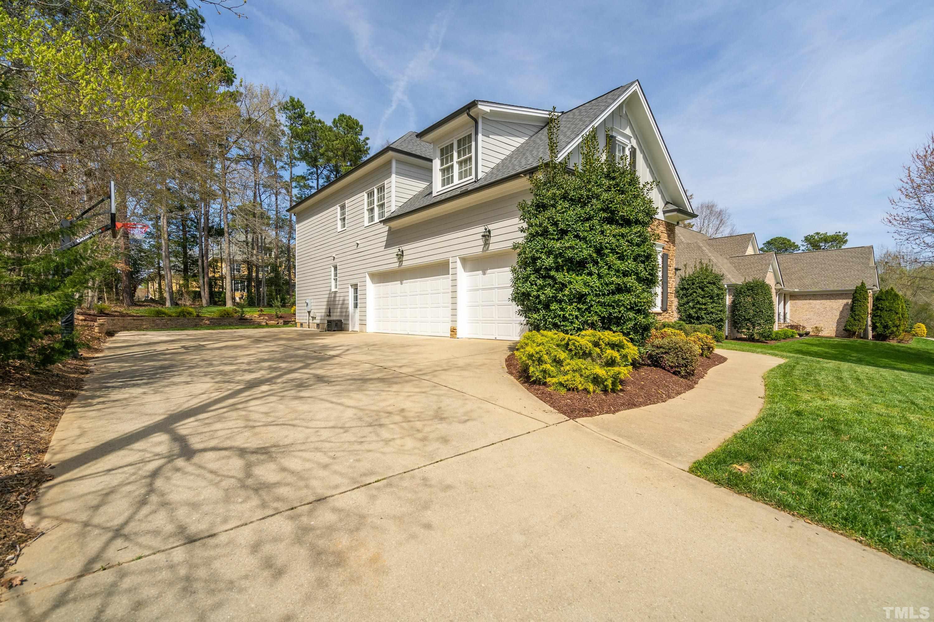 4324 Summer Brook Drive Apex, NC 27539 - Photo 56 of 70 a view of a house with a garden