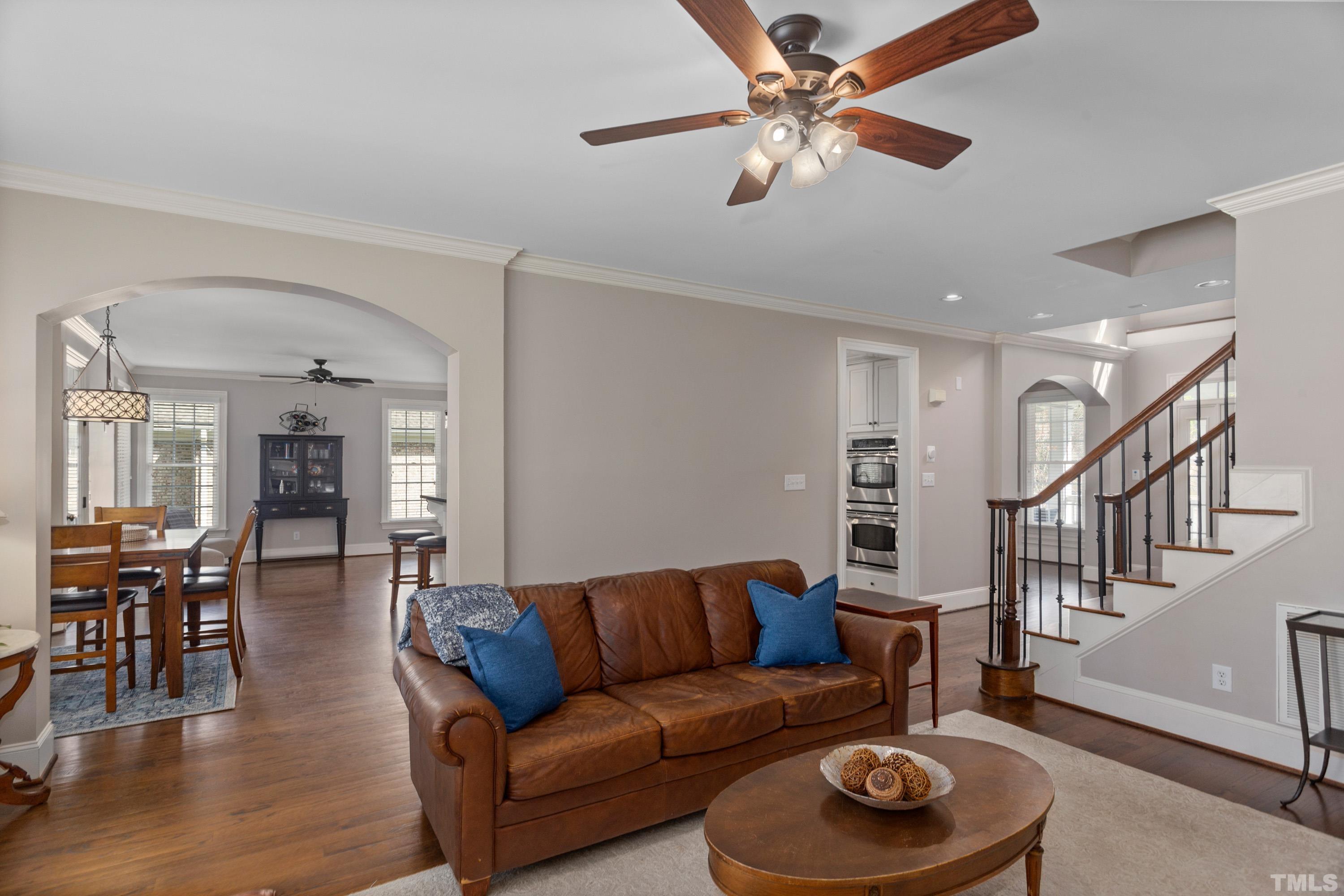 4324 Summer Brook Drive Apex, NC 27539 - Photo 6 of 70 a living room with furniture and wooden floor