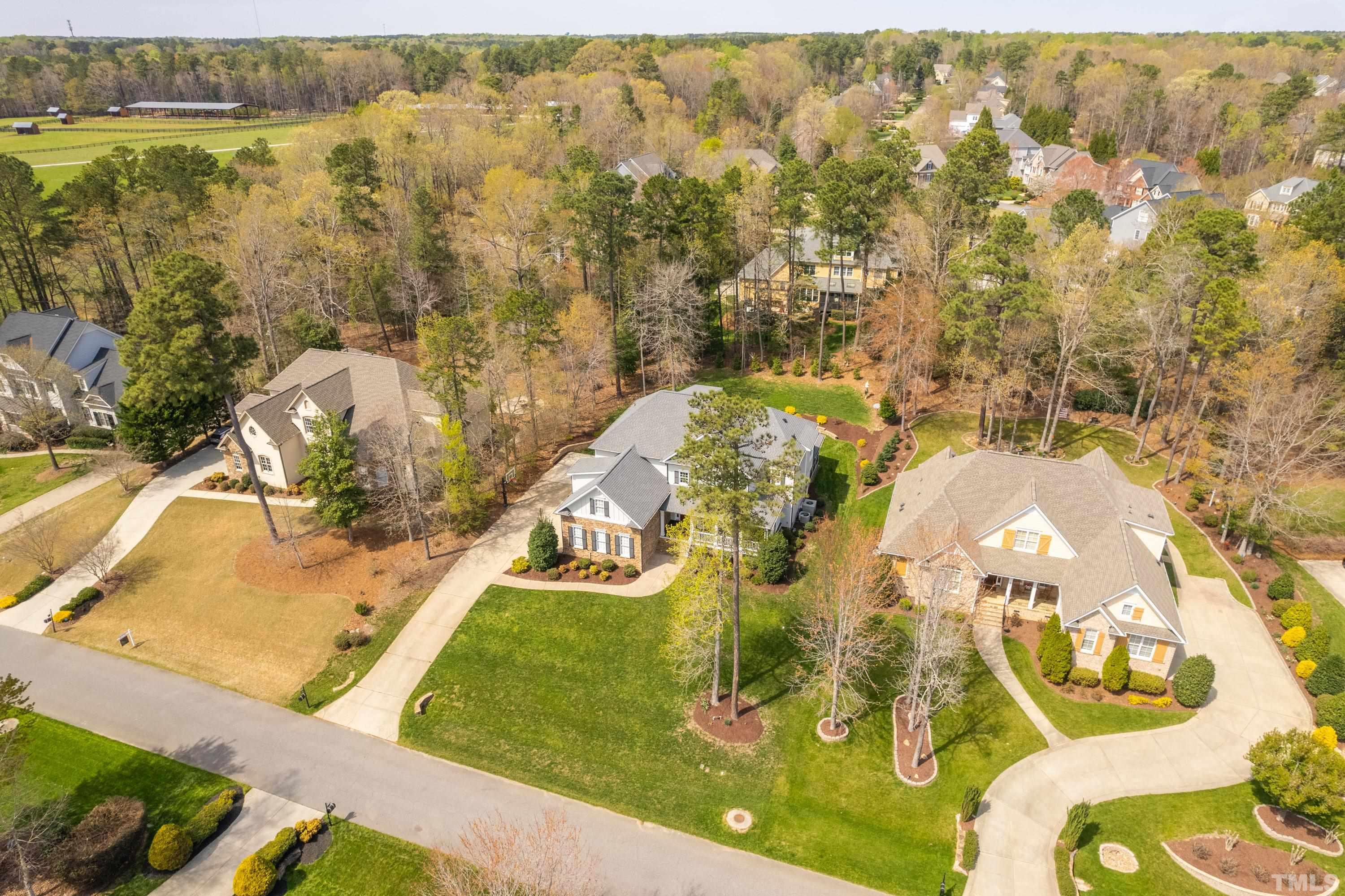 4324 Summer Brook Drive Apex, NC 27539 - Photo 62 of 70 a view of a swimming pool with a yard