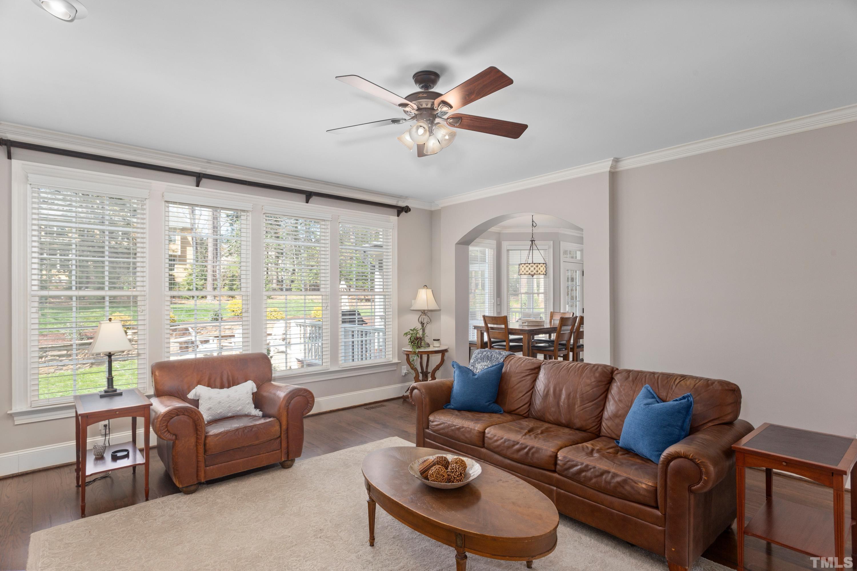 4324 Summer Brook Drive Apex, NC 27539 - Photo 8 of 70 a living room with furniture and a large window