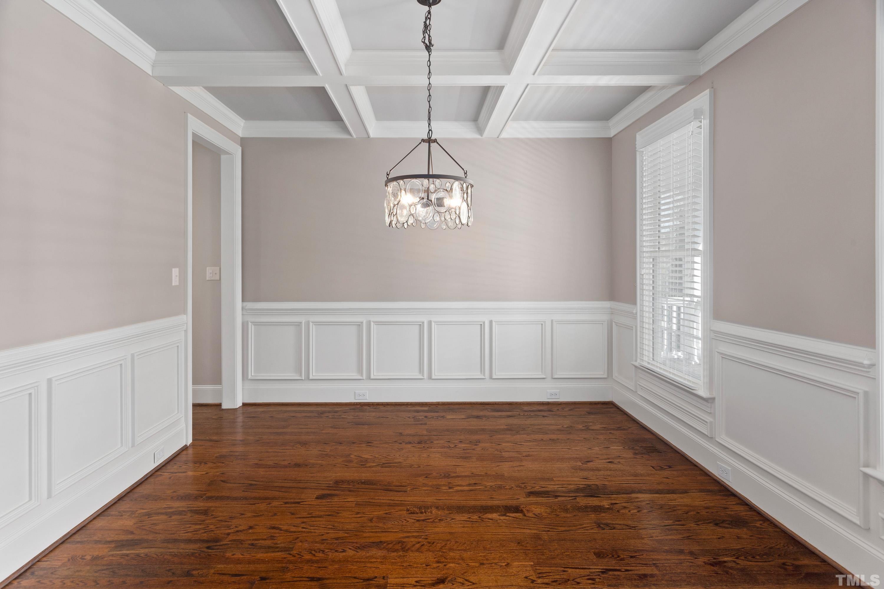 4324 Summer Brook Drive Apex, NC 27539 - Photo 10 of 70 a view of an empty room with wooden floor and a window