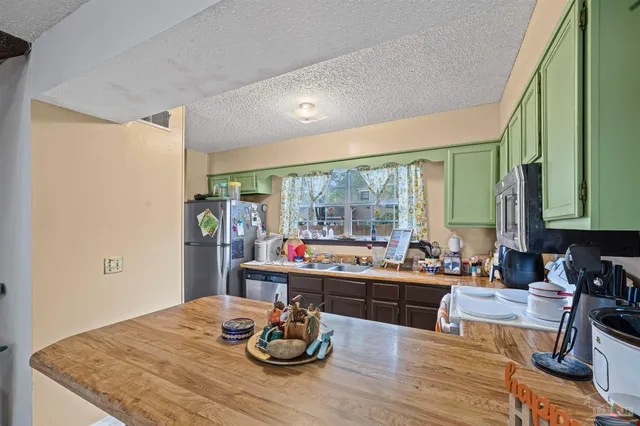 a room with furniture and a large window