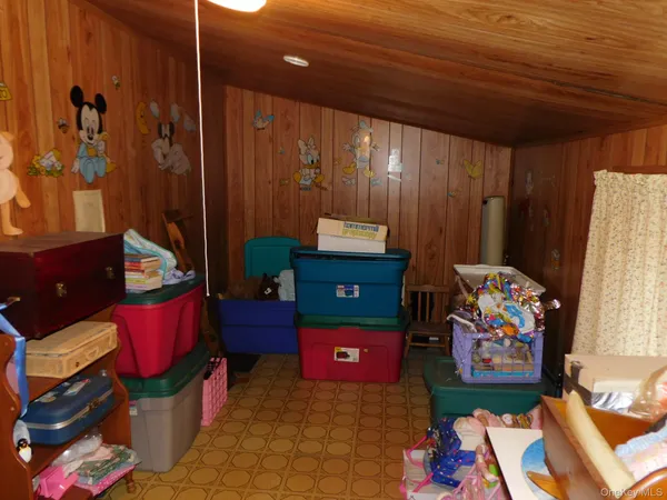 a living room with furniture and a gate