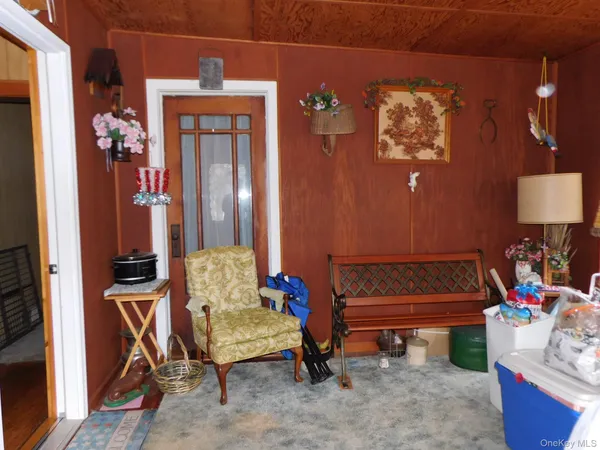 a living room with furniture and a table