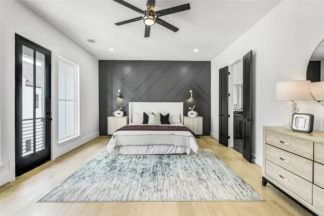 a bed room with a bed and a window