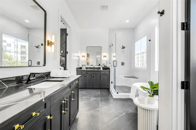 a kitchen with a sink stove and cabinets