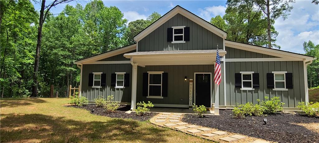 252 Aderhold Rogers Road Commerce, GA 30530 - Photo 1 of 1 front view of a house with a yard