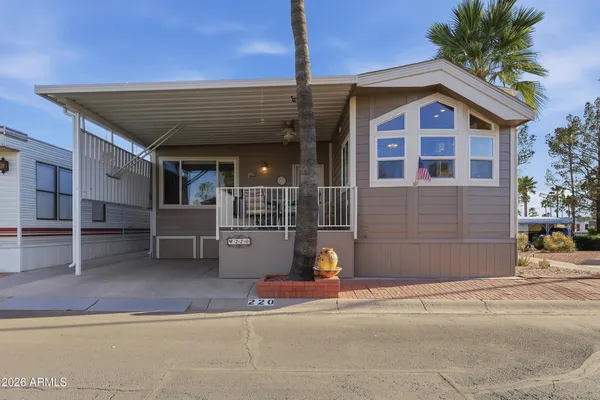 a front view of a house with a garage