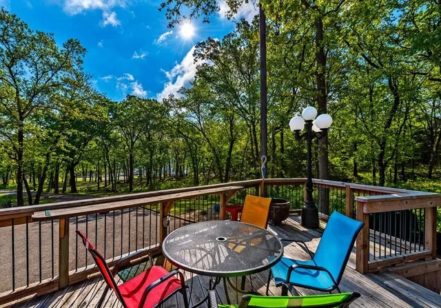 a view of a balcony with chairs