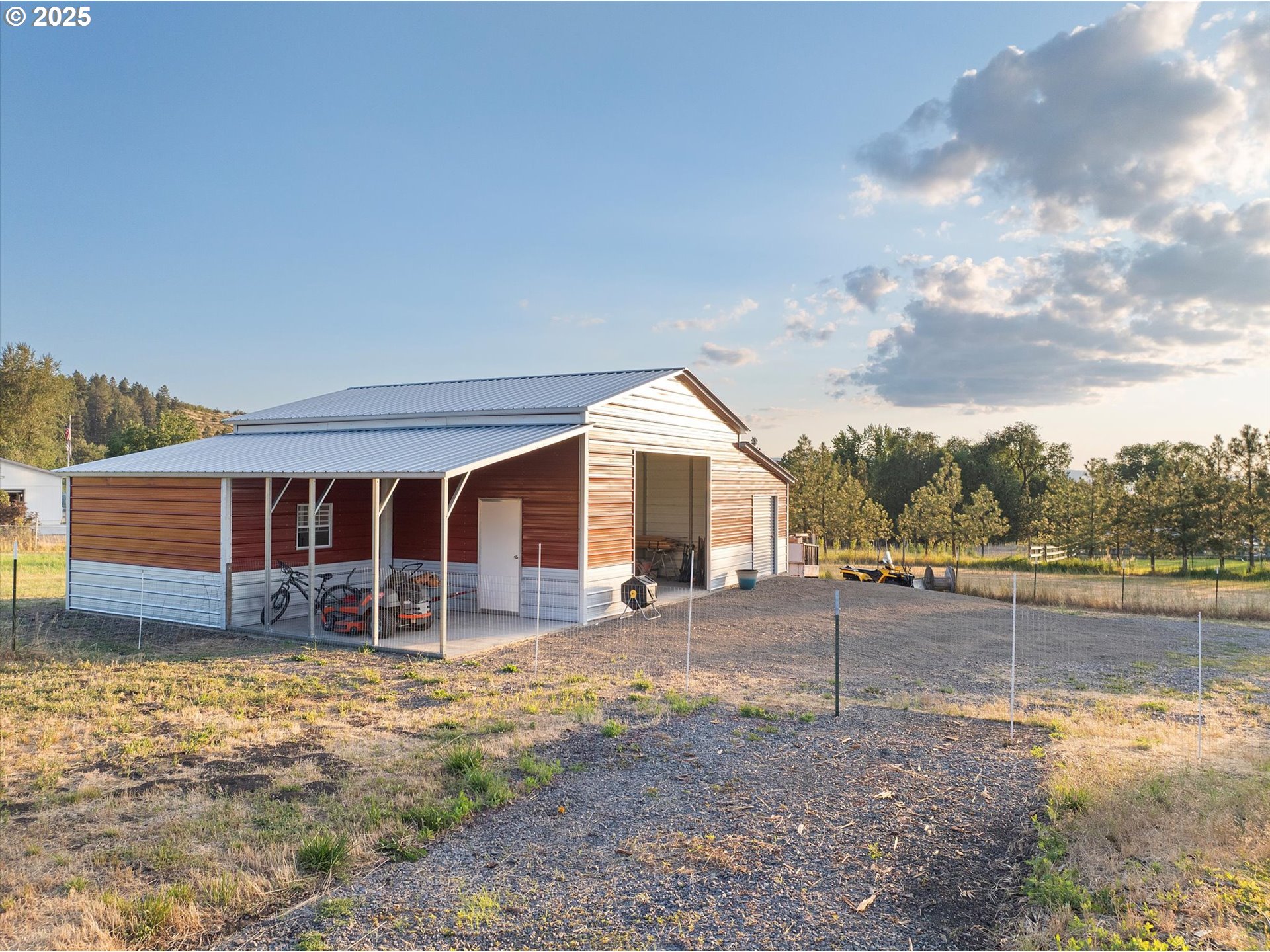 1008 Foster Street Cove, OR 97824 - Photo 28 of 33 a view of a house with backyard and sitting area