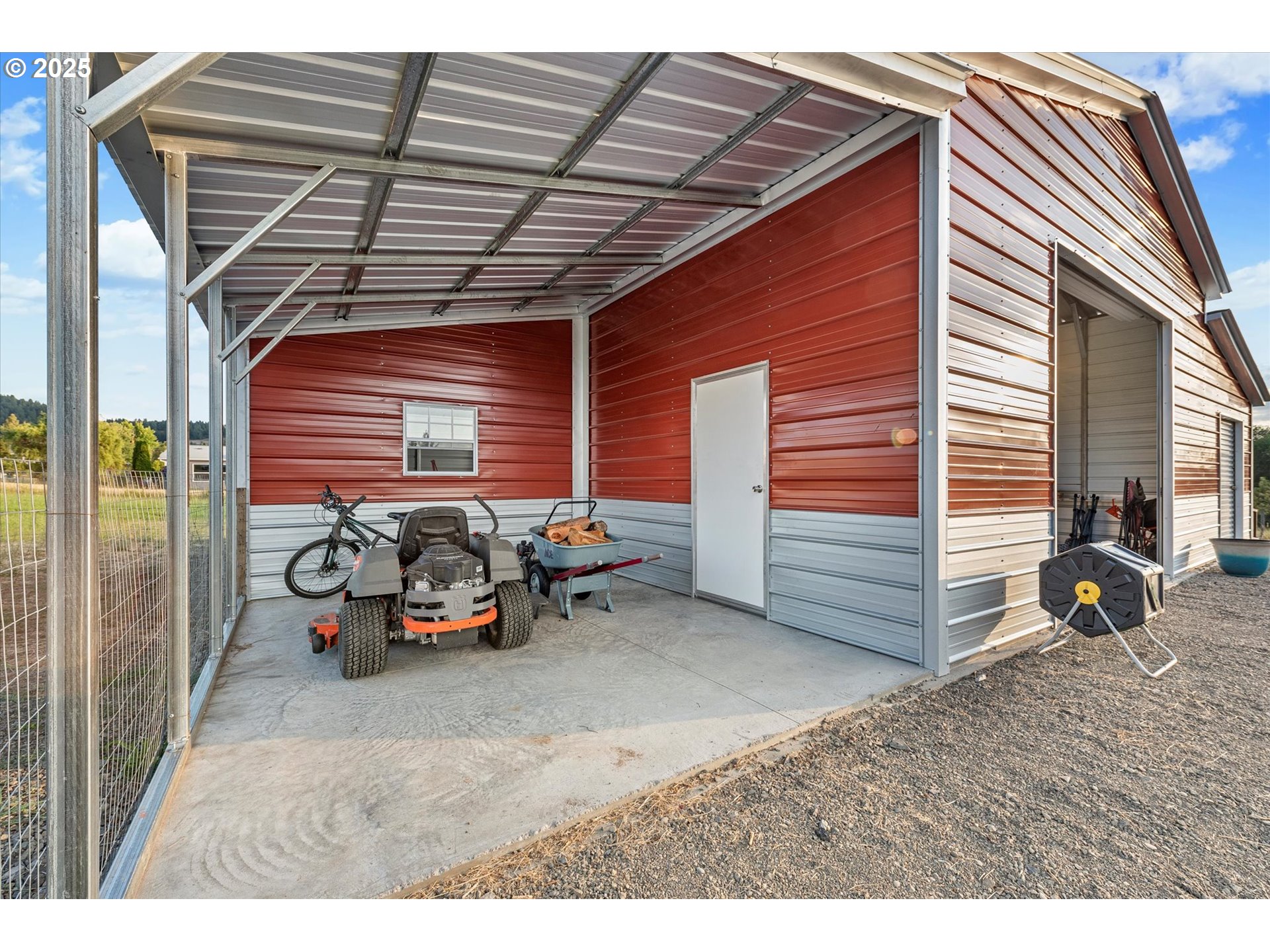1008 Foster Street Cove, OR 97824 - Photo 33 of 33 a view of a garage with parked cars