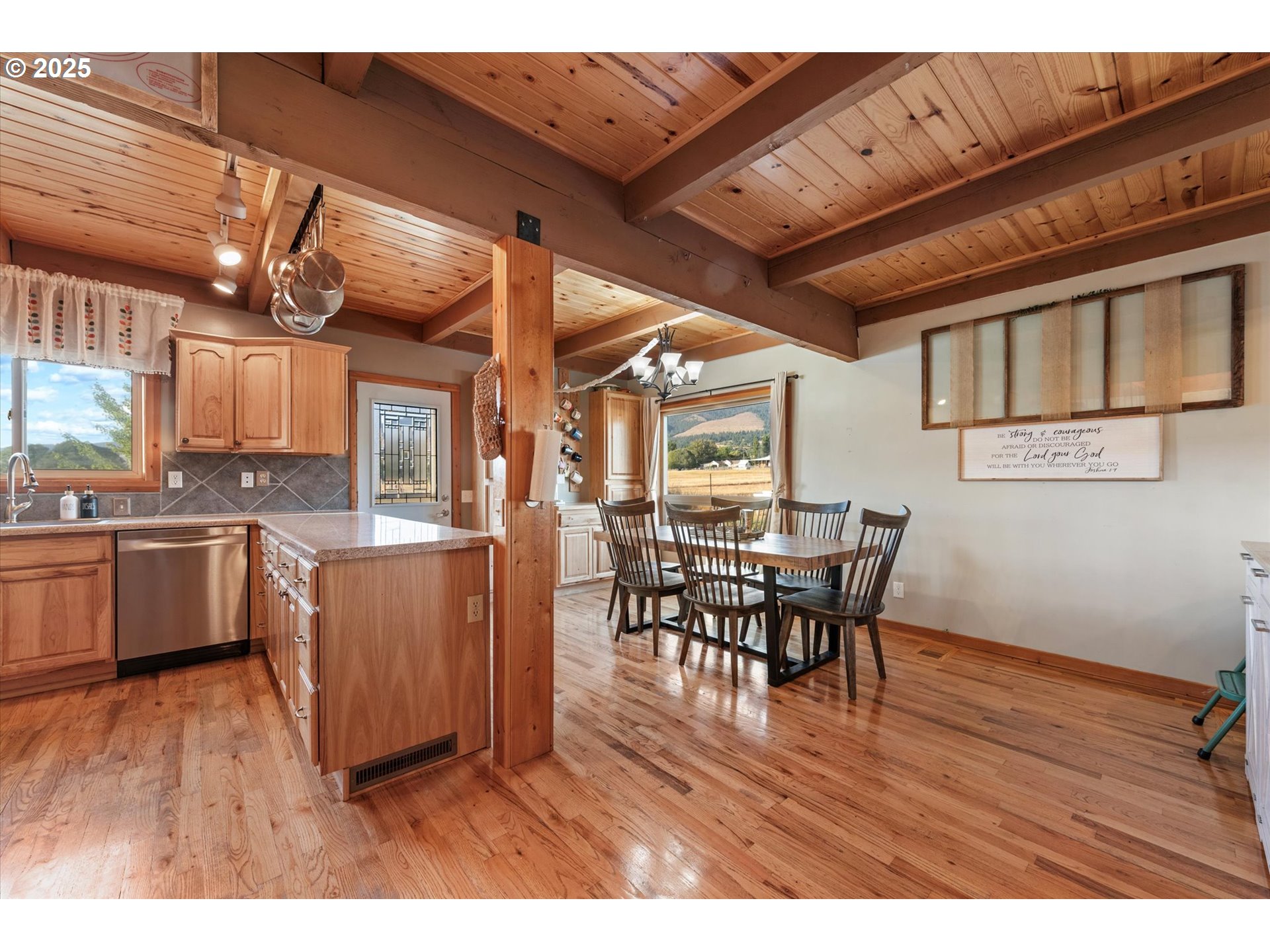 1008 Foster Street Cove, OR 97824 - Photo 10 of 33 a view of a dining room with furniture and wooden floor