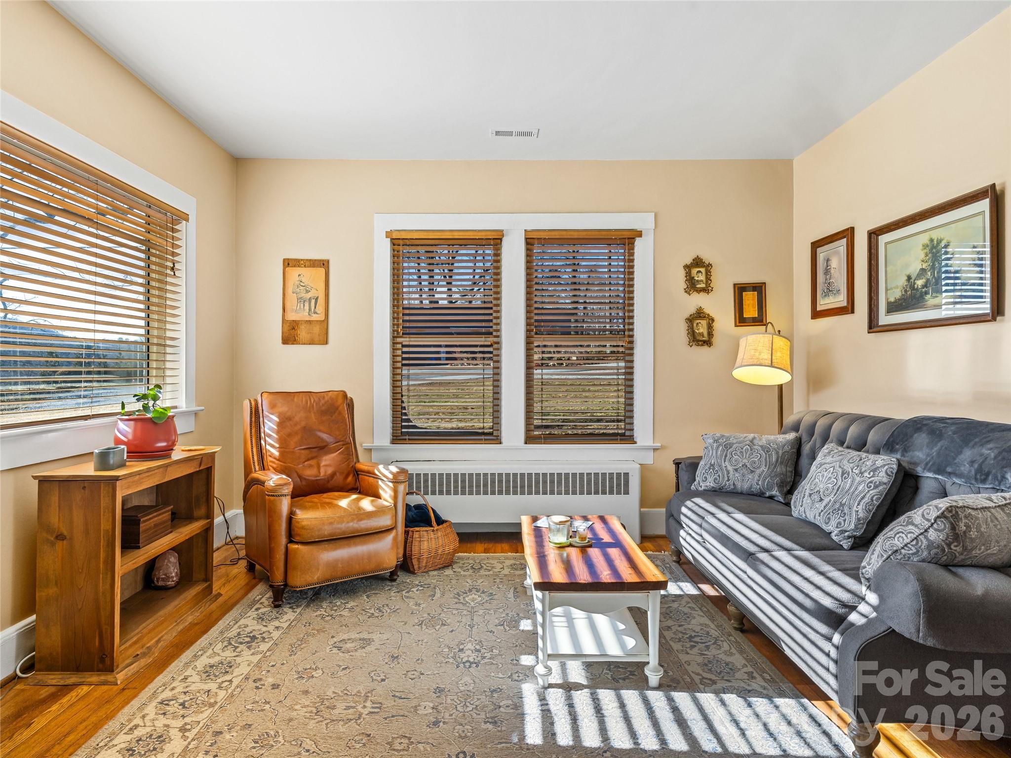 104 Campground Road Hendersonville, NC 28791 - Photo 11 of 32 a living room with furniture and a window