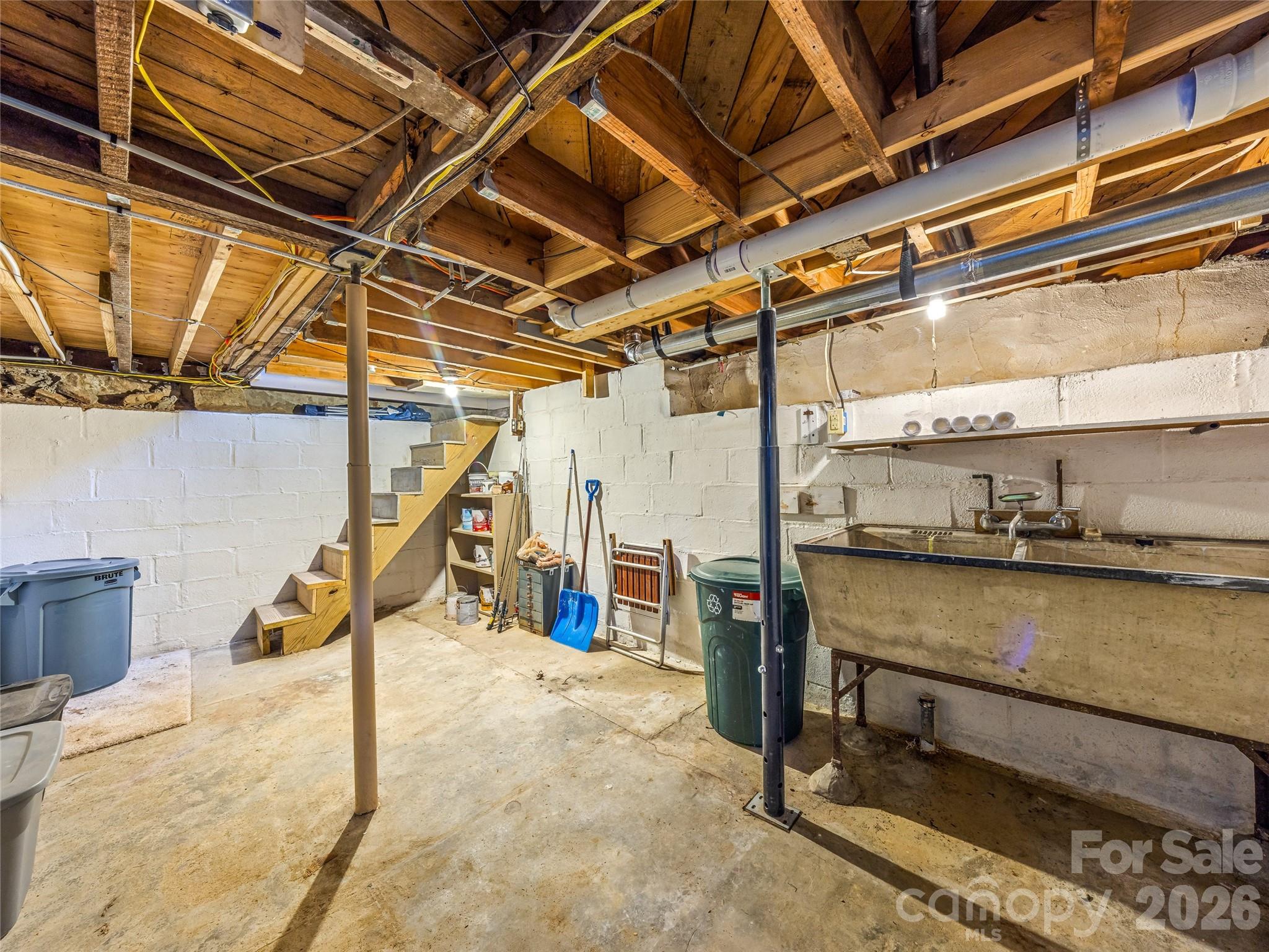 104 Campground Road Hendersonville, NC 28791 - Photo 22 of 32 a view of a room with wooden stairs