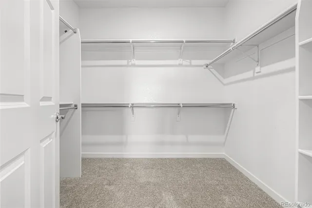 a view of an empty walk in closet
