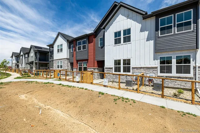 a front view of a house with a patio