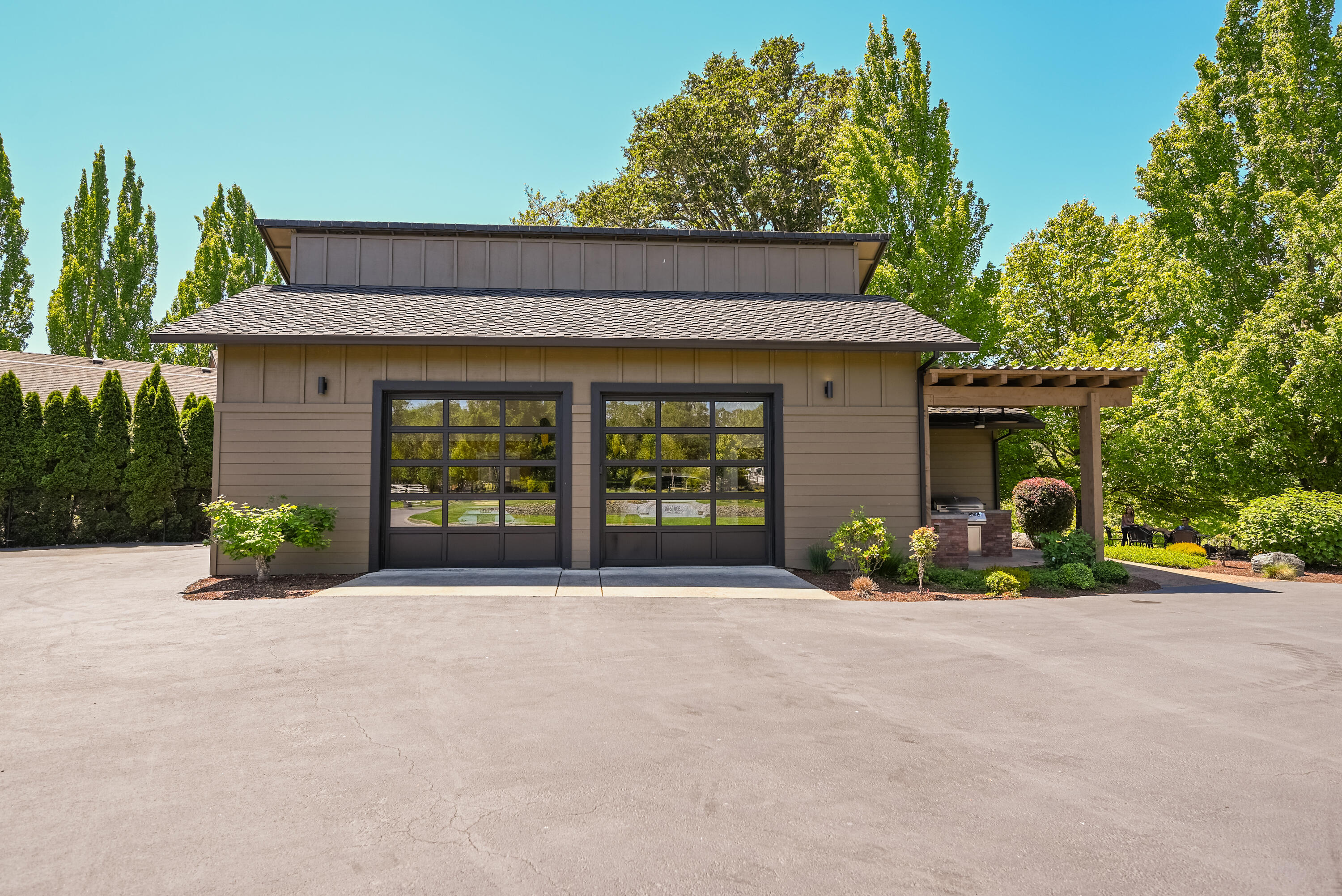 2546 Fisher Road Roseburg, OR 97471 - Photo 47 of 59 a front view of a house with a yard and potted plants
