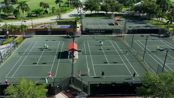 an aerial view of a tennis ground and tennis court