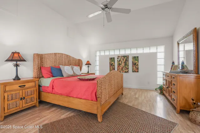 a bed room with a bed and a dresser