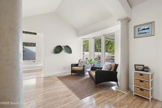 a living room with furniture and a window