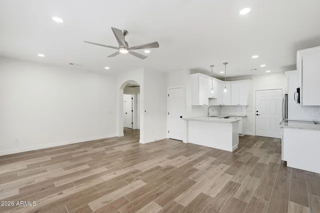 a view of kitchen with wooden floor