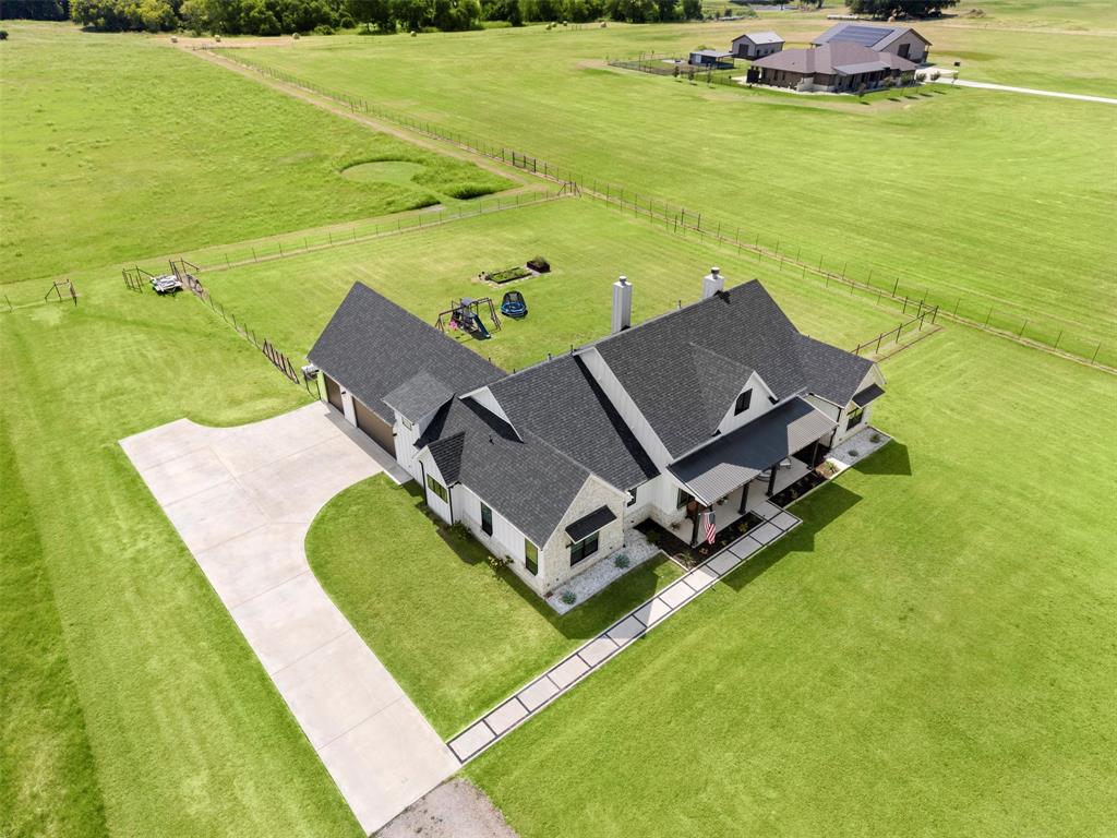861 Brindley Road Maypearl, TX 76064 - Photo 36 of 36 Stone and siding exterior with dark-shingled roofing
