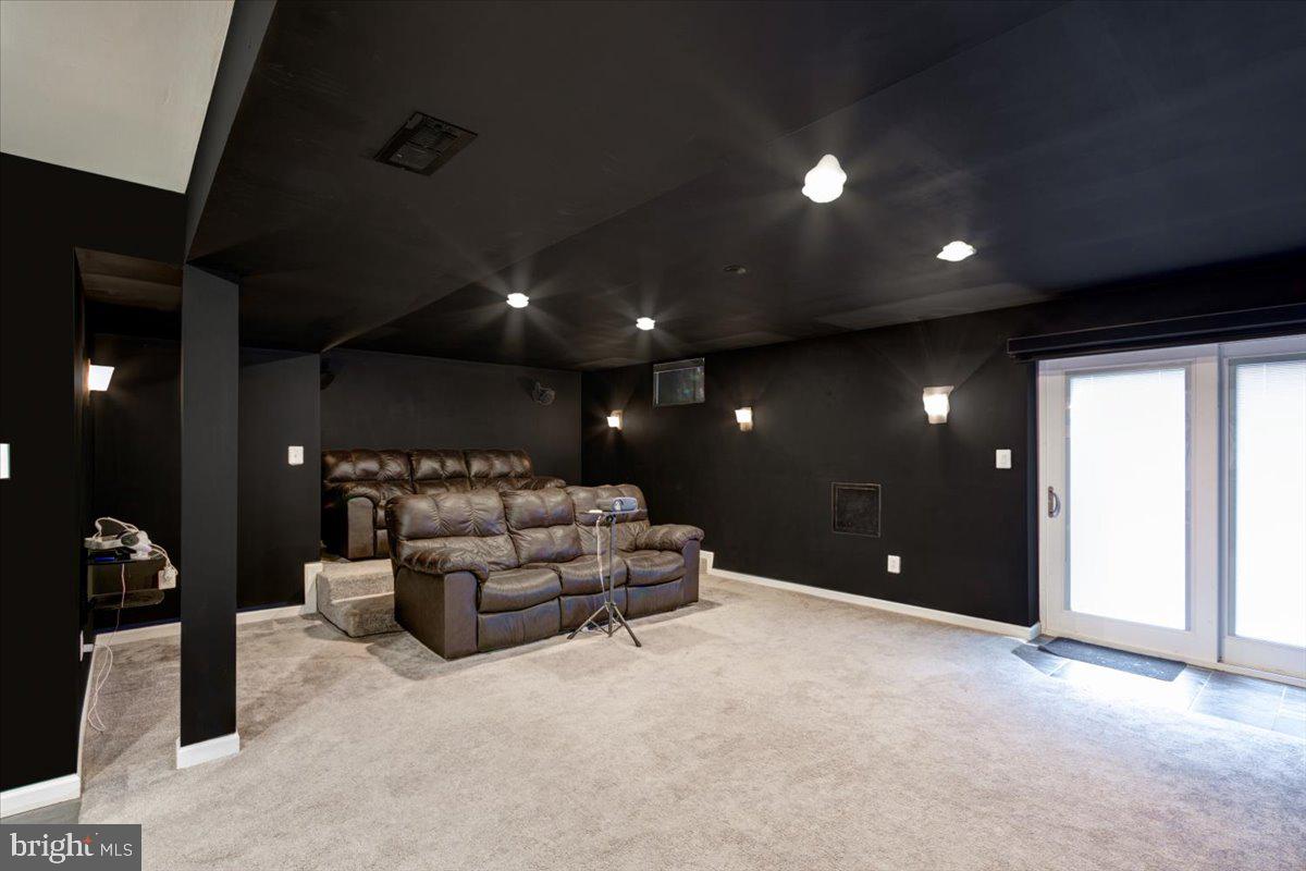 12581 Curling Road Manassas, VA 20112 - Photo 26 of 53 Theater Room complete with screen and projector