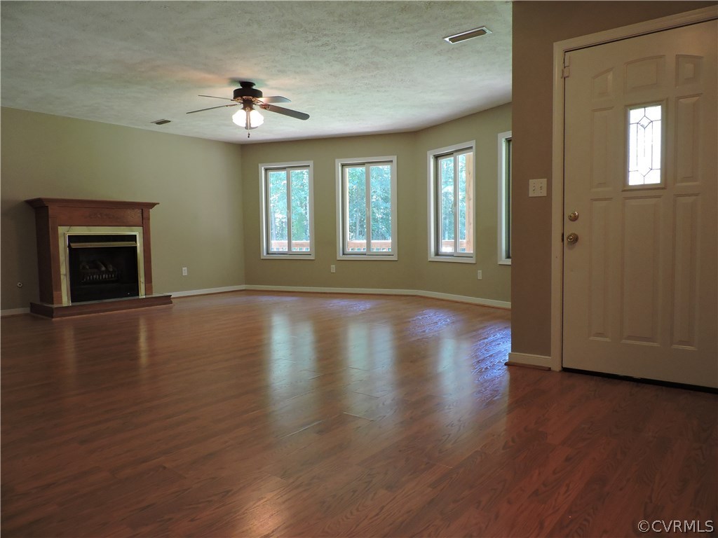 23640 Skinquarter Road Moseley, VA 23120 - Photo 21 of 34 Family room has a grand view of private front yard