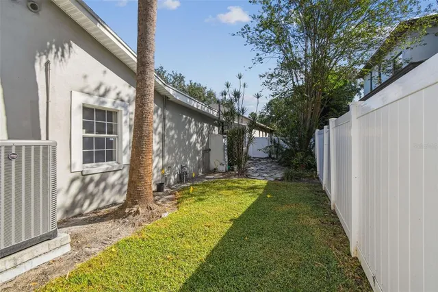 a view of swimming pool with a backyard
