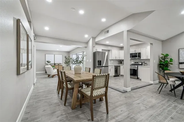 a view of a dining room with furniture
