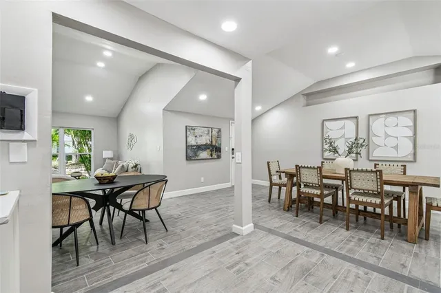 a view of a dining room with furniture