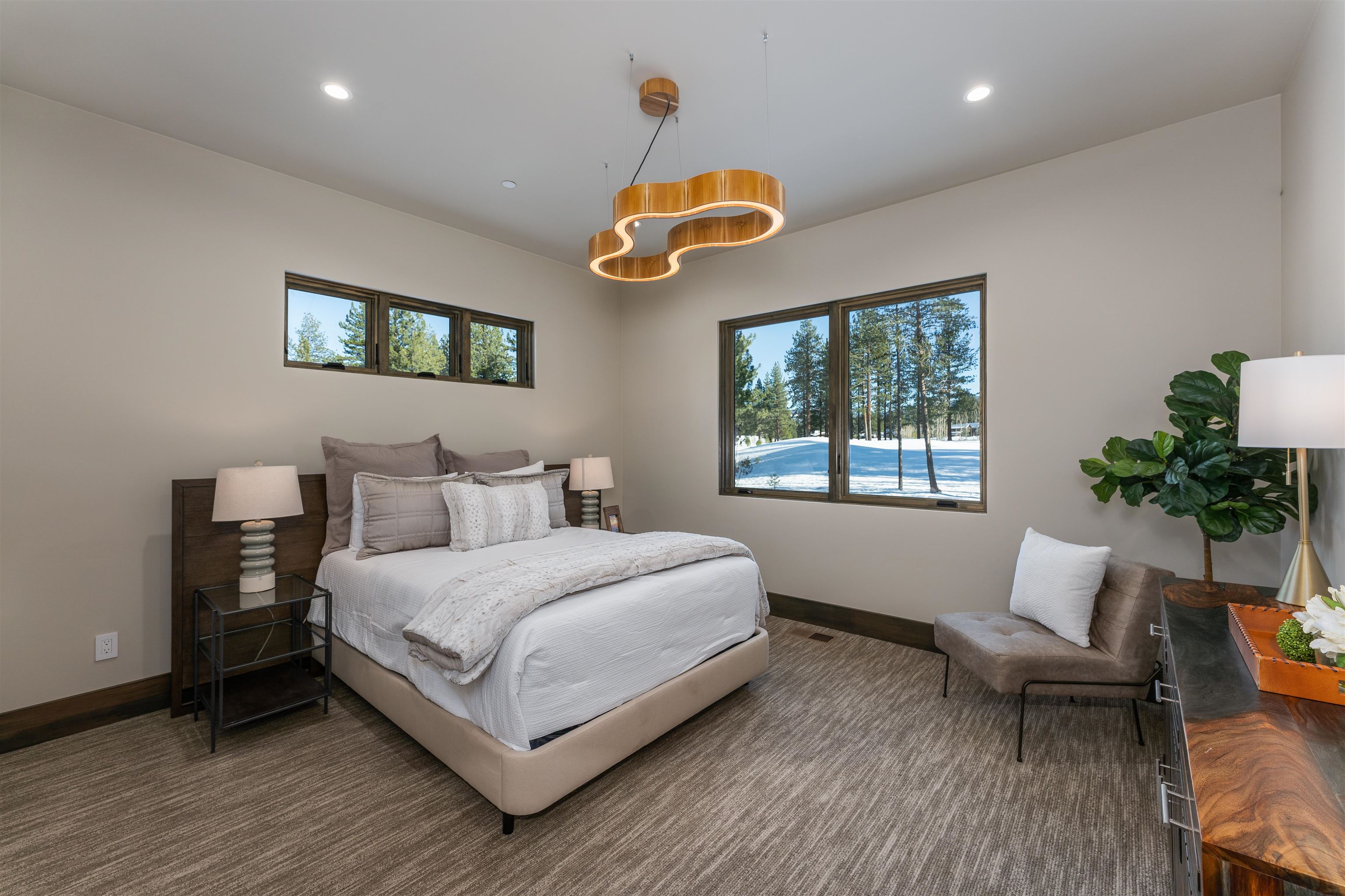 13150 Snowshoe Thompson Circle Truckee, CA 96161 - Photo 11 of 21 a bedroom with a bed and a chair