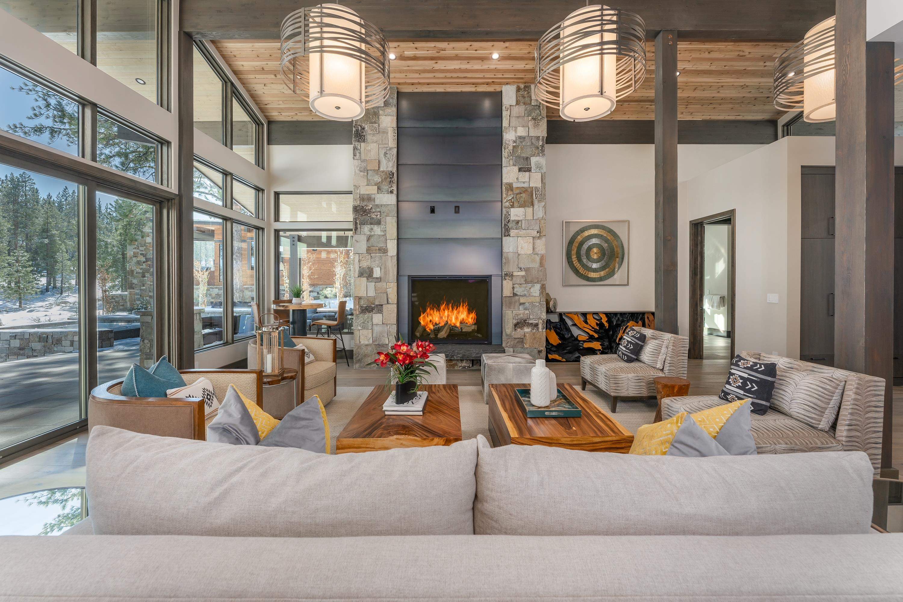13150 Snowshoe Thompson Circle Truckee, CA 96161 - Photo 6 of 21 a living room with fireplace furniture and a large window