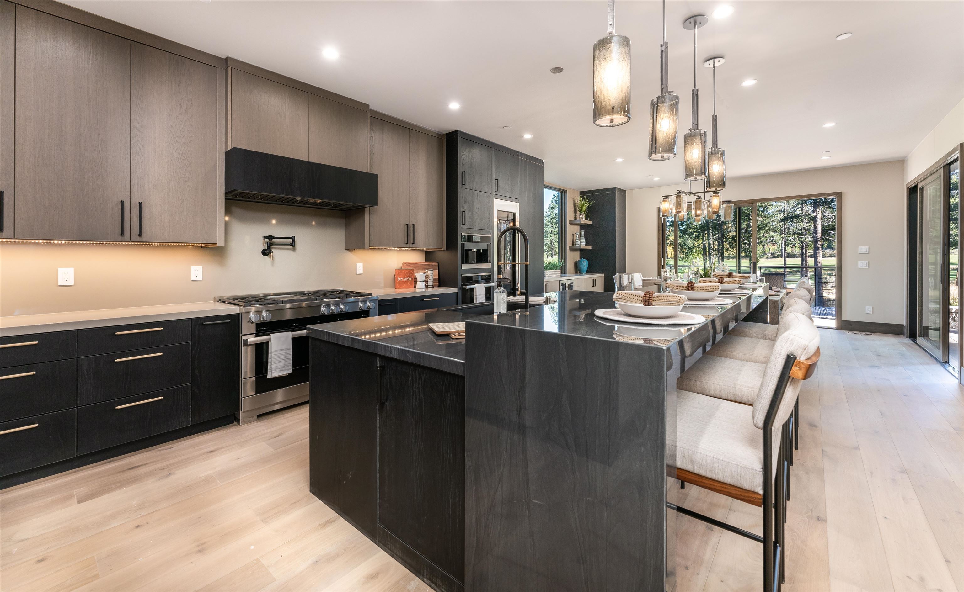 13150 Snowshoe Thompson Circle Truckee, CA 96161 - Photo 7 of 21 a kitchen with granite countertop a sink appliances and cabinets