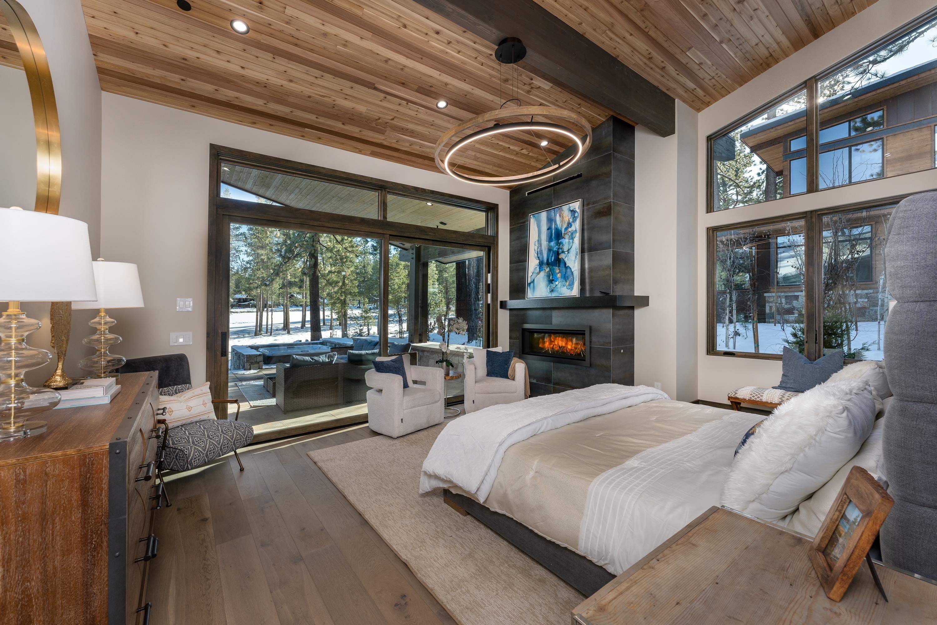 13150 Snowshoe Thompson Circle Truckee, CA 96161 - Photo 9 of 21 a large bedroom with furniture and a large window