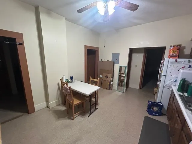 a room with furniture and a flat screen tv